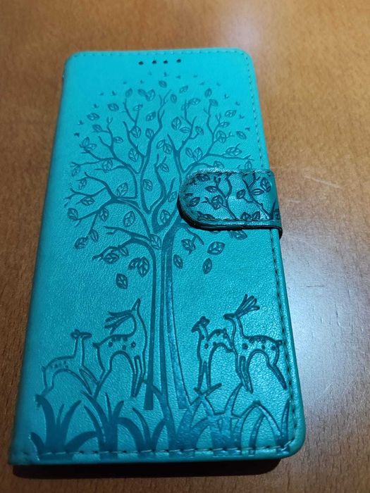 Capa para telemóvel em forma de livro. Nova, sem uso.