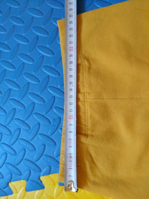 żółte spodnie z meszkiem 134 H&M