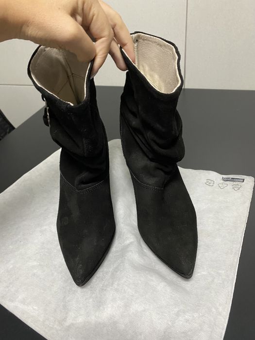 Botas com salto novas