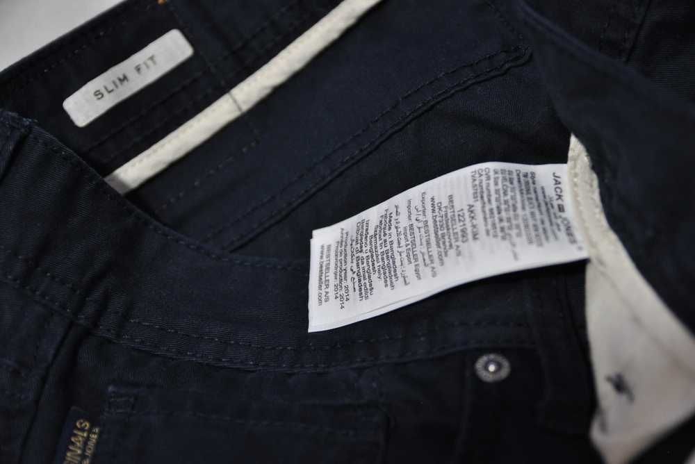 JACK & JONES S 82cm 30/32 męskie spodnie jeansowe slim navy blue s10v