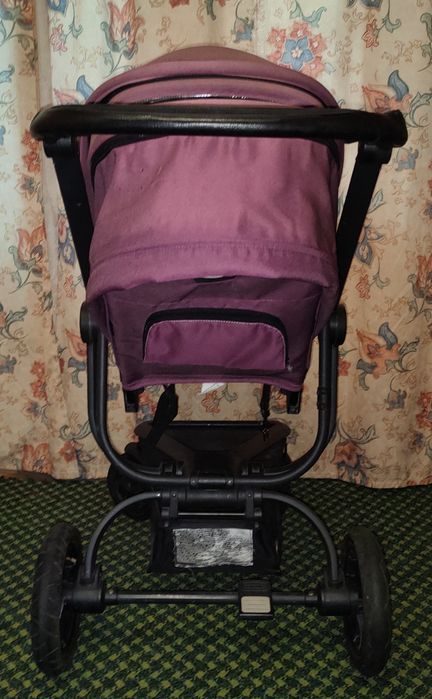 Розовая прогулочная коляска — модель BabyGo Magic New с пятиточечными ремнями безопасности