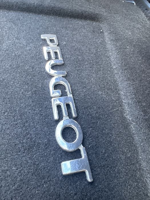 Emblemat Znaczek klapy bagaznika Peugeot 206