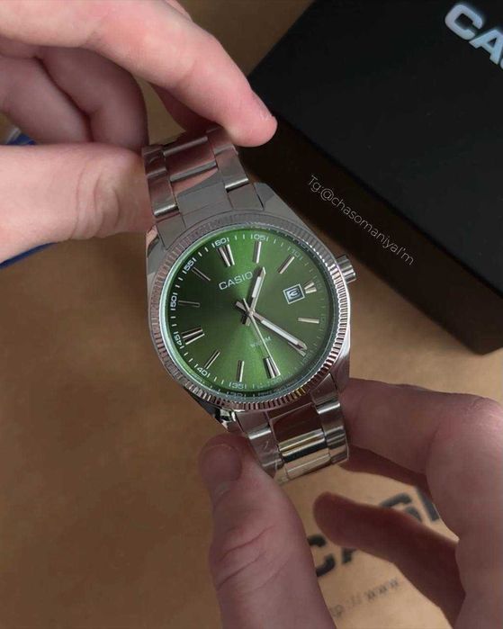 Класичний годинник Casio MTP-1302 з зеленим циферблатом