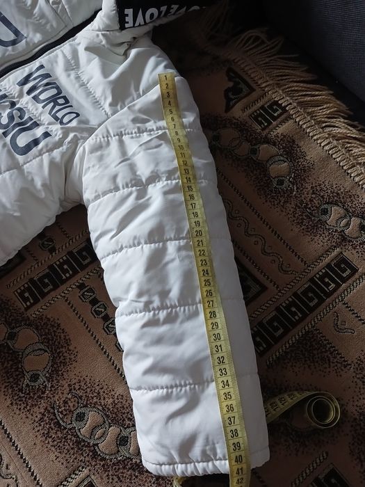 Зимова  куртка на дівчинку 110- 118 см