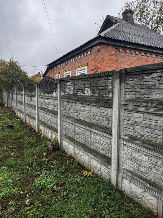 Продам уютный  дом усадьбу в г. Змиев!