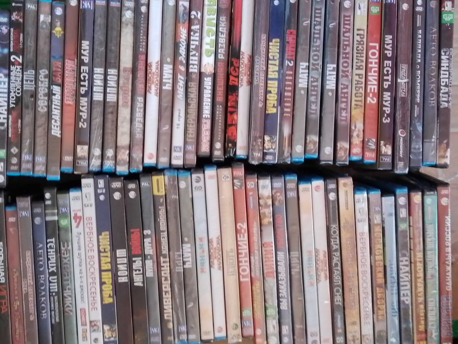 Диски 100 шт.  DVD нові
