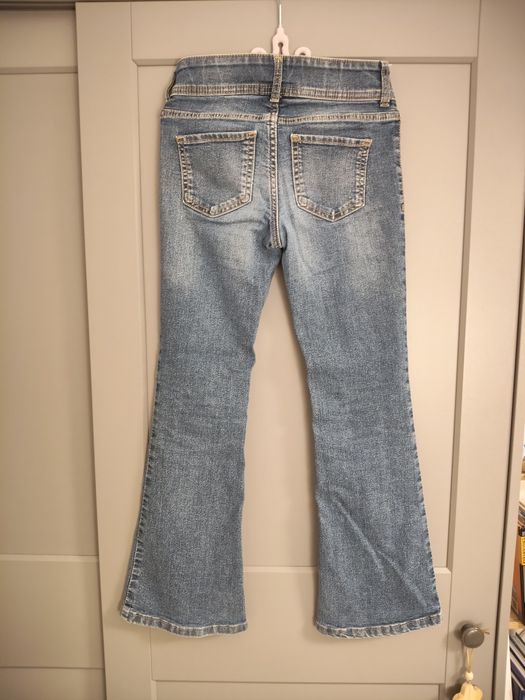 H&M spodnie dżinsy dzwony flared leg, 134