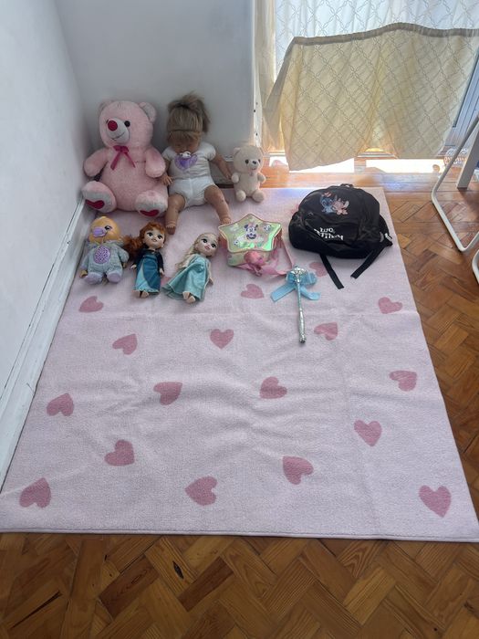 Carpet with few toys and bags