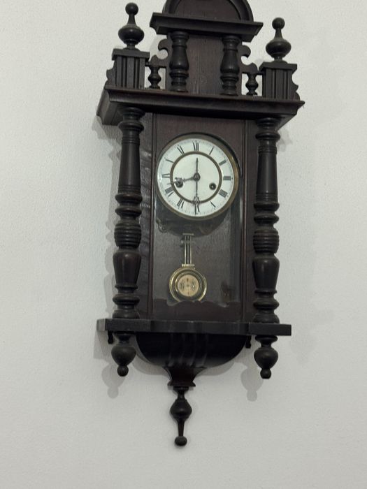 Relogio de prede com corda