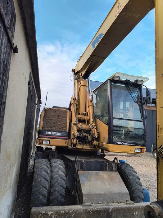 Koparka Caterpillar M315 na kołach