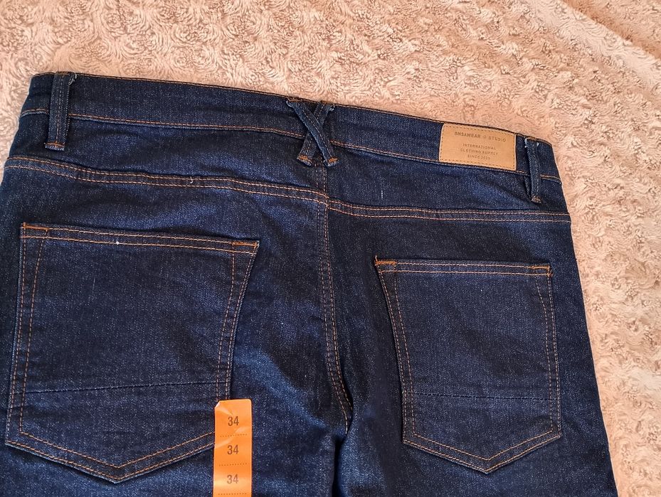 Spodnie jeansy Sinsay 34 Nowe ciemny jeans męskie chlopiec