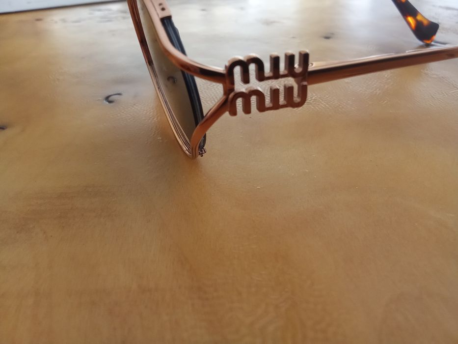 Óculos de sol MIU MIU