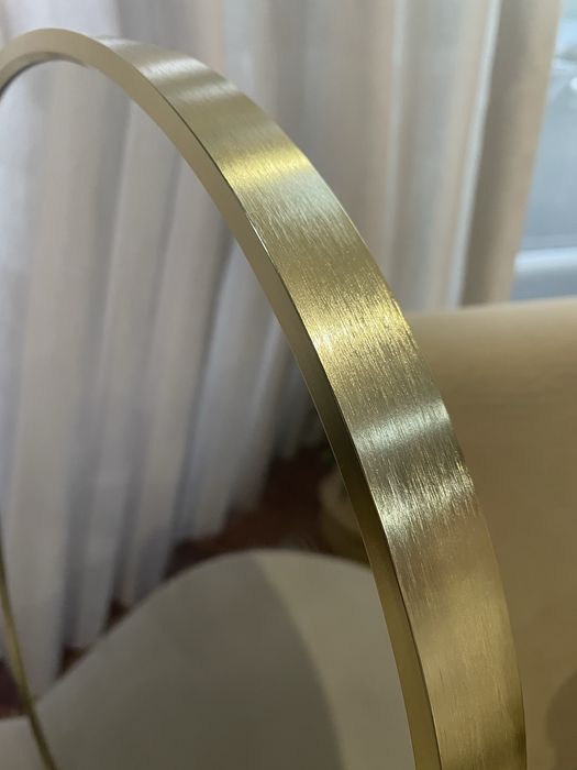 Espelho dourado redondo