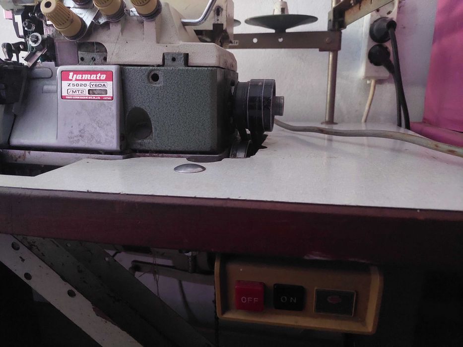 Máquina de costura corta e cose zamato