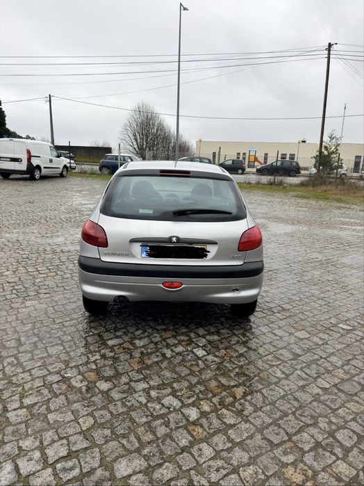 100 mil kms 206 comoletamente nova