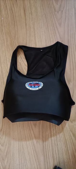 Protecção de peito para senhoras