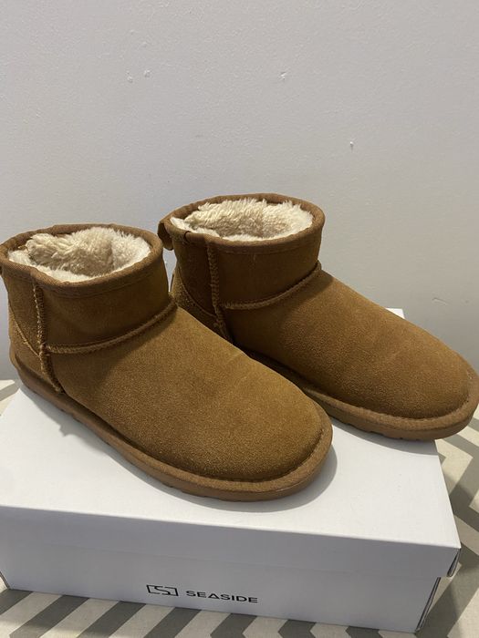 Bota castanha de pelo