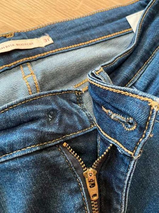 Spodnie damskie jeansy Levis 725 high rise bootcut navy granatowy popular Pinterest 31