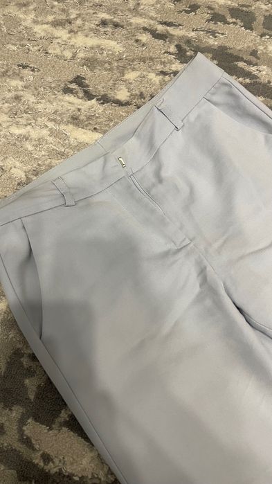 Блакитні штани жіночі