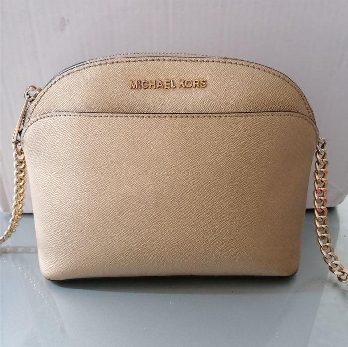 Mala Michael Kors dourada
