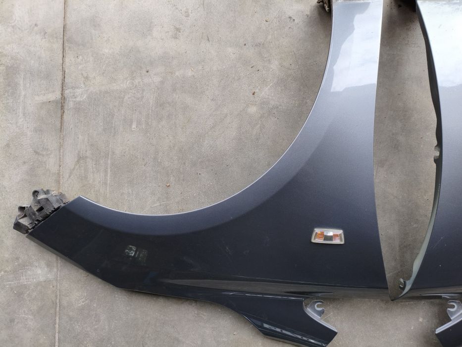 Opel Corsa E Błotnik przedni prawy Kolor Z10B