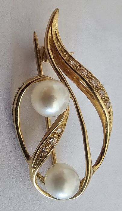 Alfinete ouro 19k com duas perolas