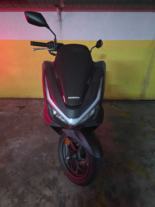 Mota nova com pouco uso