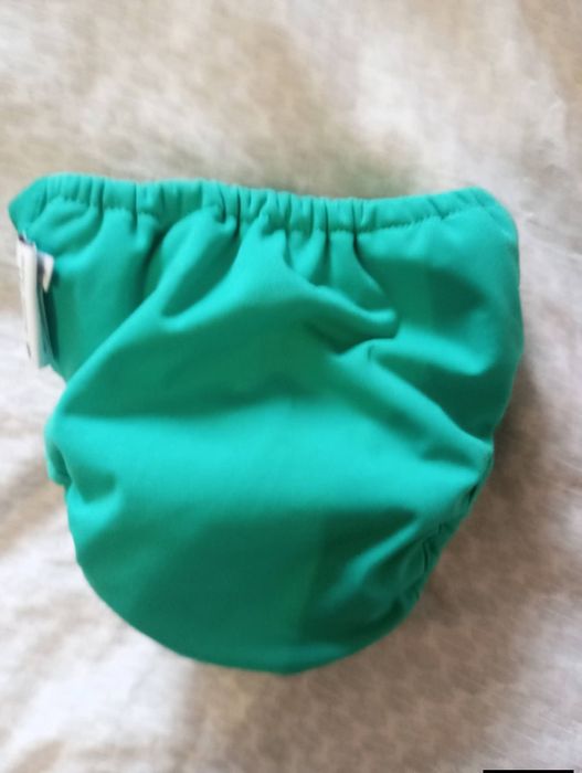 Продам багато разовий підгузник на скільки кг на фото