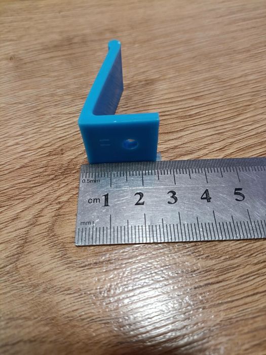 Фіксатор підвіконня