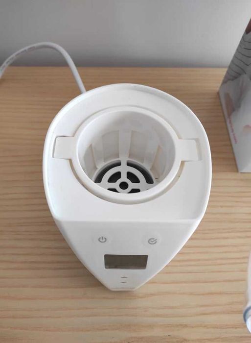 Aquecedor de biberões Miniland e esterilizador para casa e carro