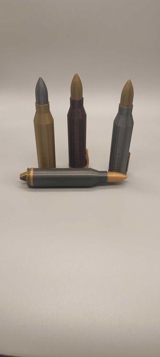 Pojemniki na naboje / kapsuły co2 12g w kształcie naboju, karabińczyki, airsoft, bb, akcesoria, wiatrówki.