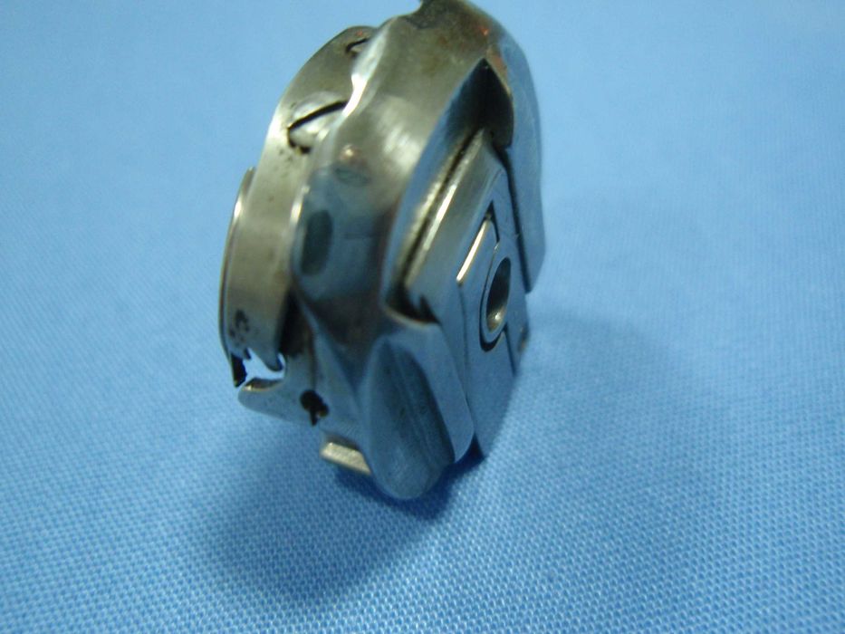 Reparação mecânica e afinação, de máquina de costura