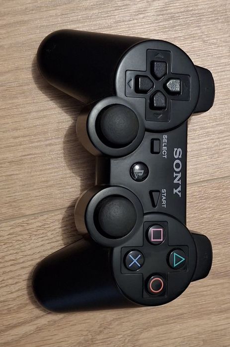 PlayStation 3 (PS3) Super Slim  500GB + Comando + 7 Jogos