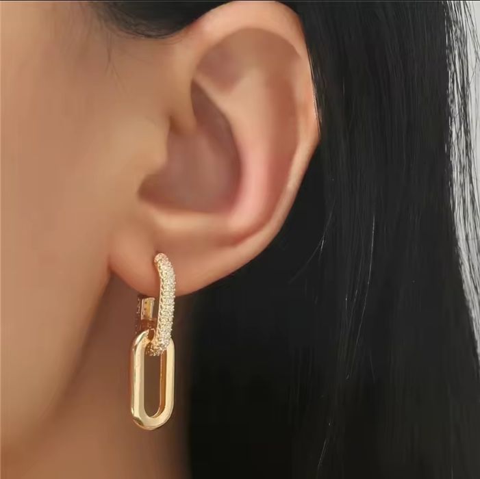 Złote kolczyki wiszące podwójne geometryczne