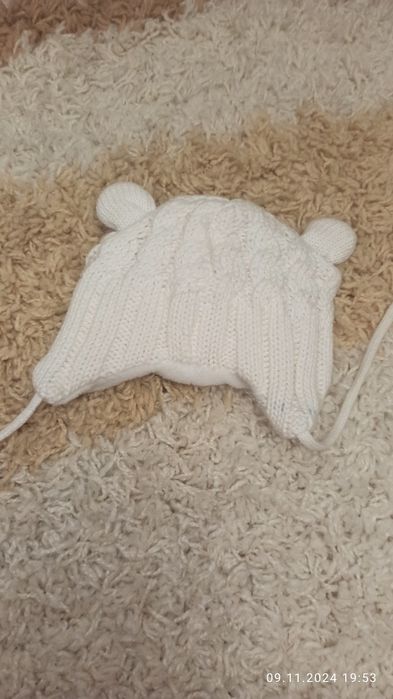 В'язана шапочка на флісі