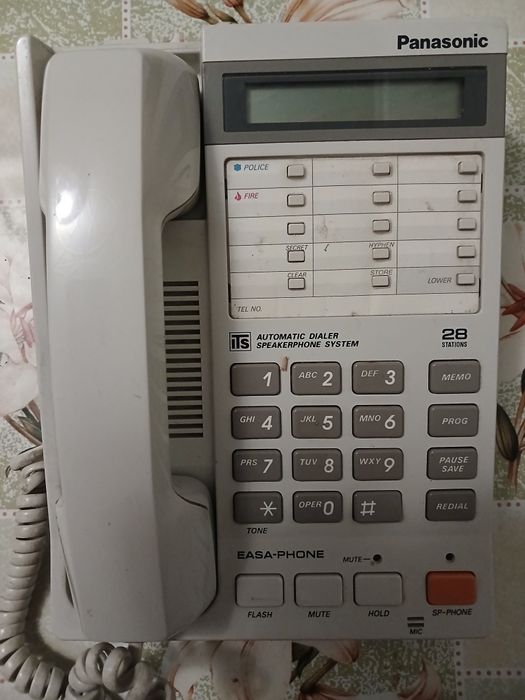 Стаціонарний телефон сірого кольору модель КХ - Т2365