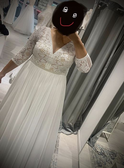 Suknia ślubna z rękawkiem