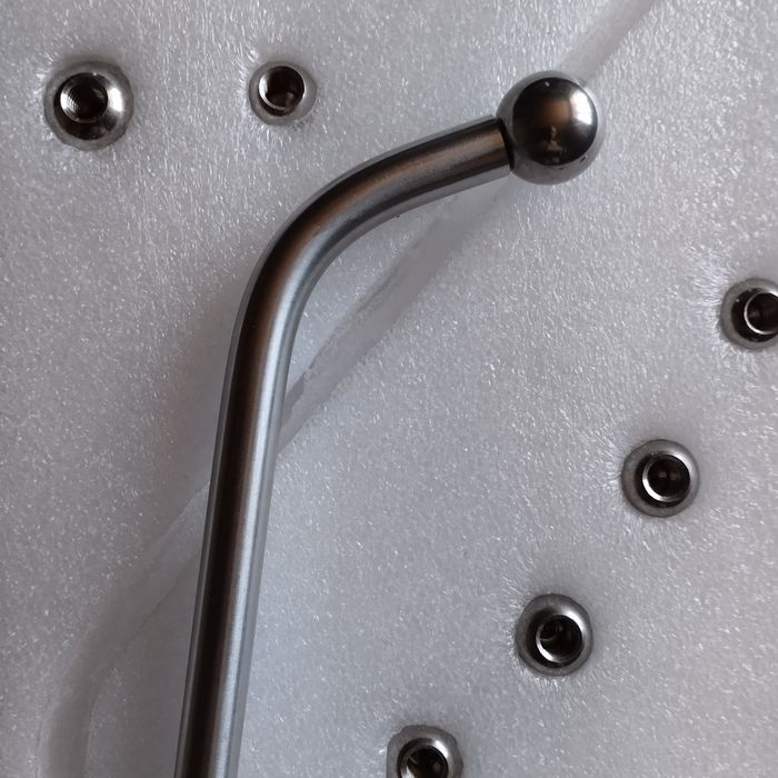 Инструмент для выравнивания вмятин на саксофоне.