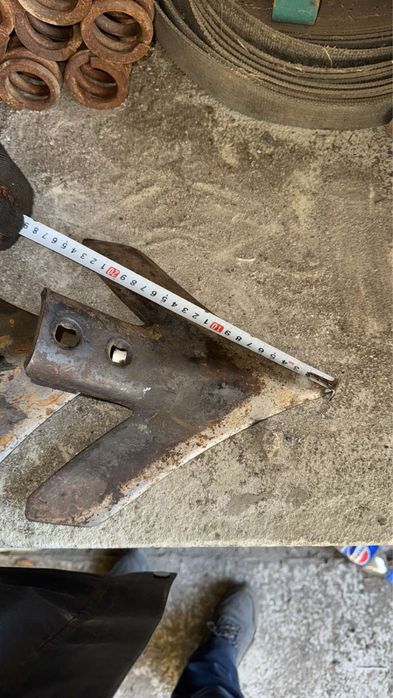 Лапи культиватора стрілки