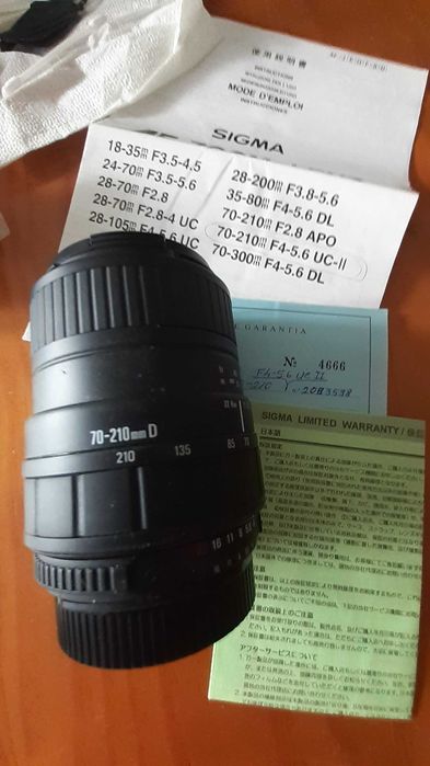 Máquina fotográfica NIKON de rolo + Objetiva SIGMA