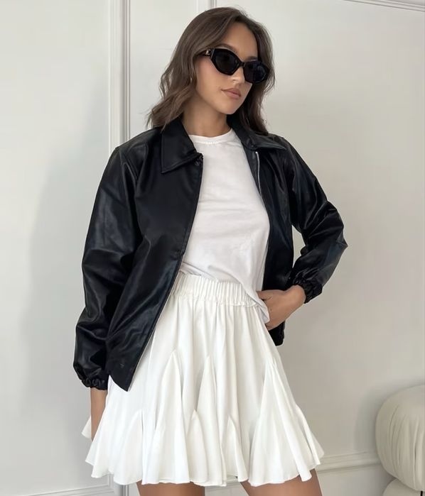 Біла спідниця-шорти з рюшками