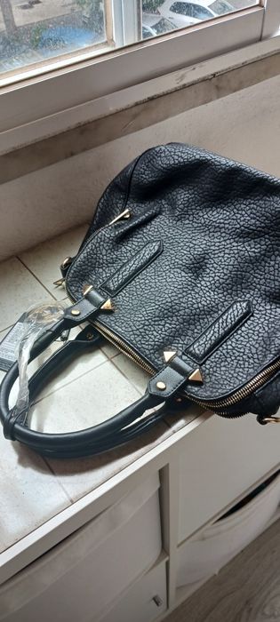 Malas de pele,cada14€