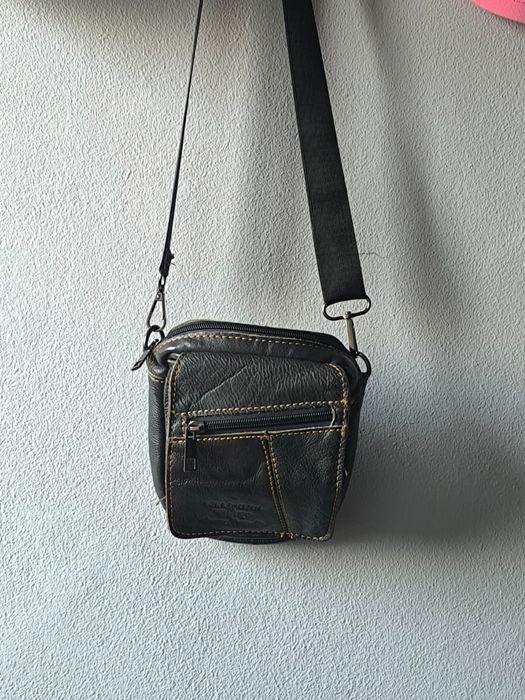 Bolsa de cabedal...