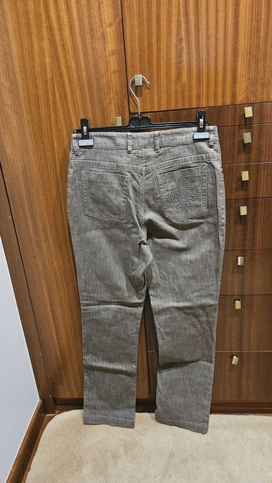 Calças ganga com aplicação bolso