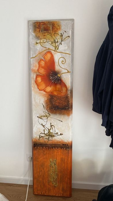Quadro com relevo laranja e dourado