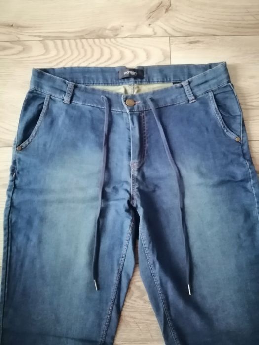 Spodnie damskie bawełniane Tchibo stylizowane na jeans.