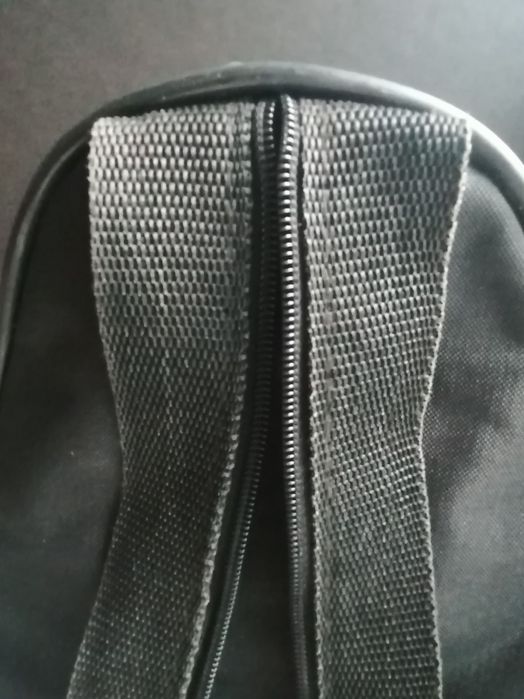 Mochila com publicidade à Coca-Cola
