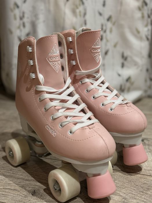 Продам Роликові ковзани б/у Oxelo 8503716 рожеві 38р.
