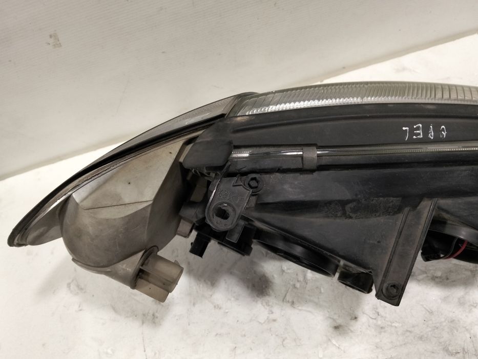 Farol Opel Vectra B ÓTICA esquerdo 1998