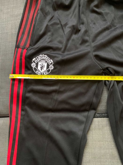 Calças de treino pretas e vermelhas do Manchester United 2021, 2022